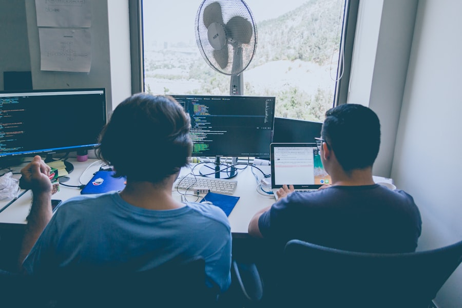 Marketing team analysing campaign performance on screens